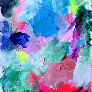 May include: Abstract painting with vibrant colors, including pink, blue, green, and yellow. The paint is applied in thick strokes, creating a textured surface.