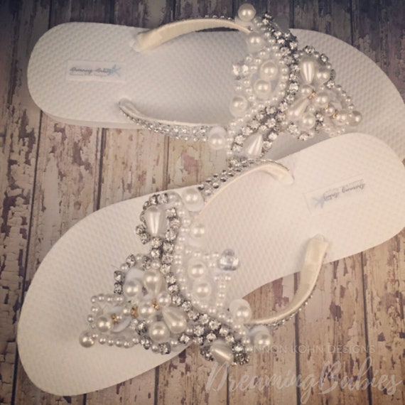 white bling flip flops