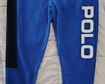 Pantalones deportivos azules de Polo Ralph Lauren con bolsillos con cremallera para hombre, talla mediana