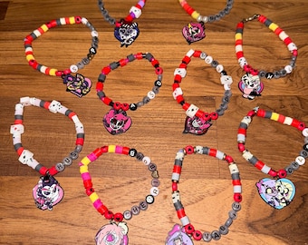 Pulseras con dijes de arcilla hechas a mano de Hazbin Hotel