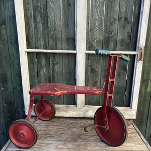 Vintage wood and metal tricycle / children&#39;s pedal tricycle with wooden seat / pedal tricycle / vintage decoration. Has been repainted.