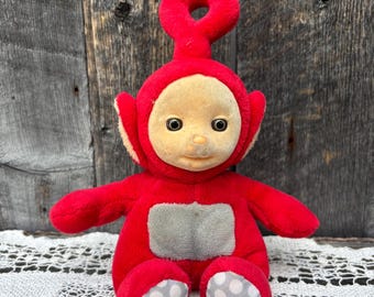 Po Teletubbie Soft Toy Red Plush 7 “ Seated - 2019. TELETUBBY FLOCKED face Plush. Damaged. See photo.