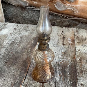 Clear Glass Miniature Kerosene/Oil Lamp, Rusty Bronze Tone Hardware, Swirled Fluted Chimney, 7&quot; Height.