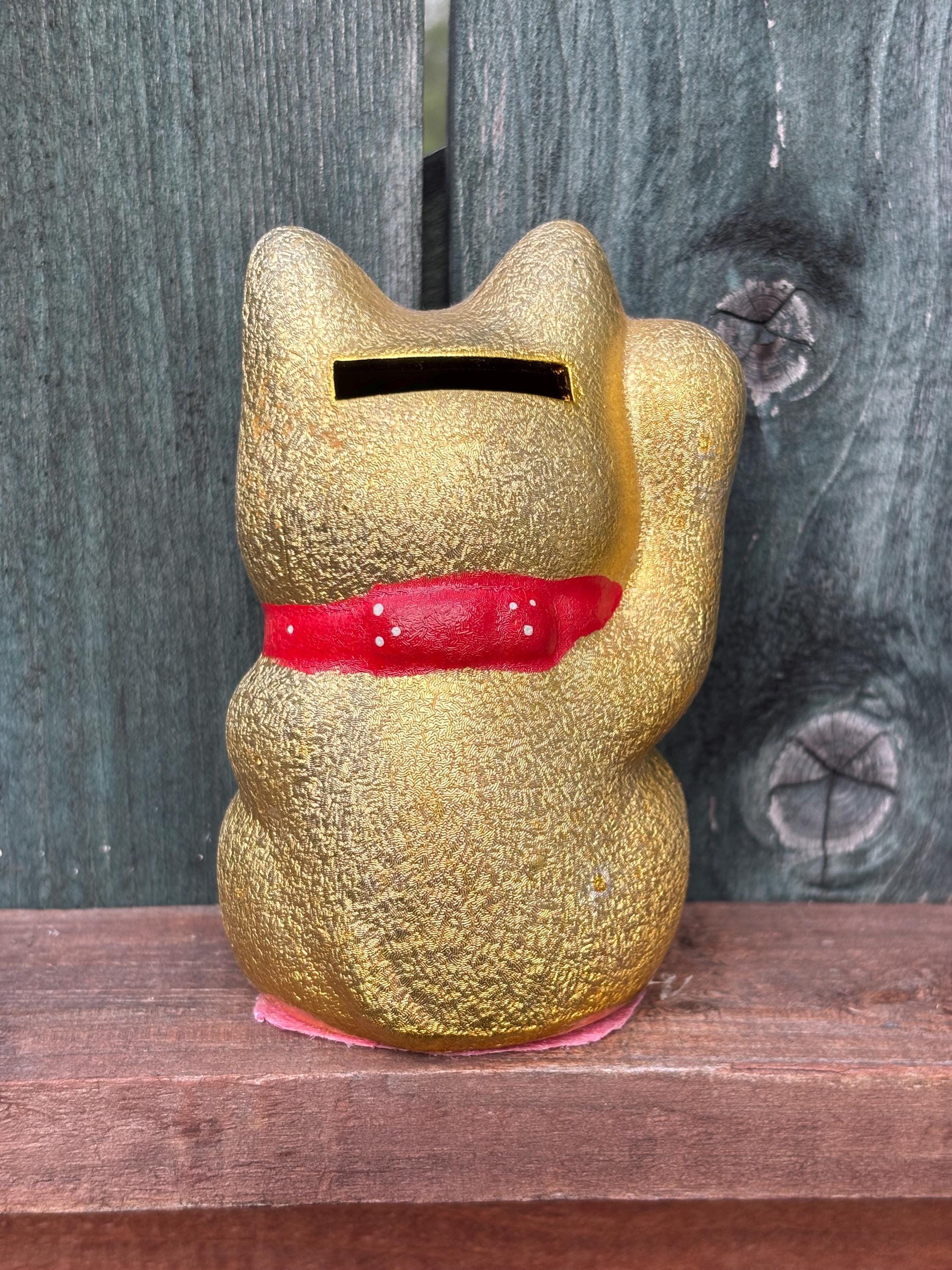 足が上がったヴィンテージの陶器製招き猫貯金箱、ゴールド。 - Etsy 日本