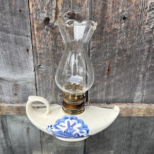 Vintage Aladdin Genie Style Small Oil Lamp. White and blue lamp with windmill motif. Without wick.