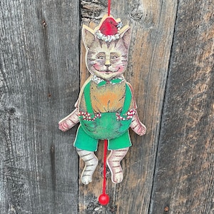 Vintage SUSAN FEVES Pull String ORNAMENT Jumping Jack Cat Wood Puppet Folk Art.