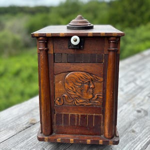 Antique chest, wooden apothecary cabinet, hand-carved cabinet, old rustic storage furniture.
