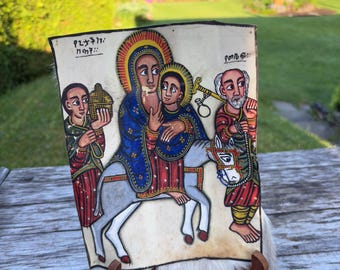 手描きのエチオピアの宗教画 - 本格的な正統派アートをご自宅の装飾に - ユニークな手作りアイコン。背中には毛皮が施されています。