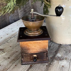 Vintage wooden coffee grinder.