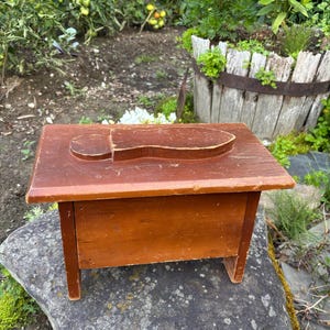 Wooden shoe shine box, vintage shoe shine box. With shoe polish accessories.