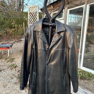 Black leather jacket with buttons for men. With winter lining and interior pocket. Men's black buttoned leather blazer style coat. Size 2-XL