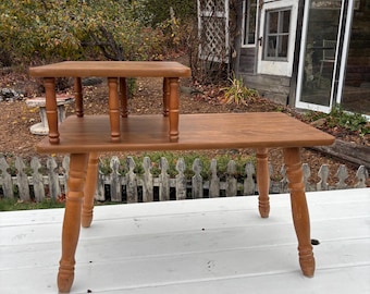 Vintage 70s modern 2 tier formica table with wooden legs.