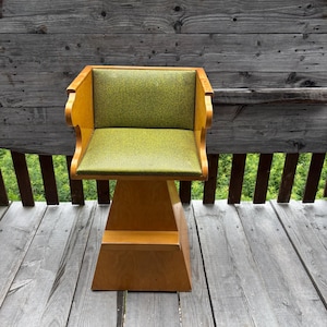 Vintage Handmade Cubist Armchair. Wooden armchair with green vinyl seat and backrest. Wooden footrest. From the 1970s.