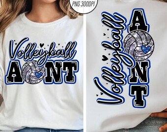 Puede incluir: Camiseta blanca con texto azul y negro que dice "Volleyball Aunt" con un gráfico de voleibol brillante. La parte posterior de la camiseta tiene el texto "Volleyball Aunt" verticalmente con un gráfico de voleibol brillante.