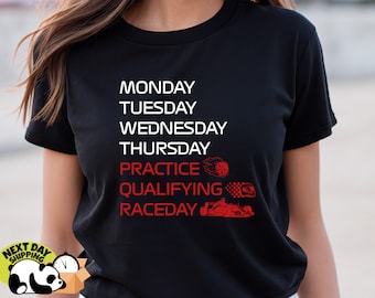 May include: Black t-shirt with white text that reads "Monday, Tuesday, Wednesday, Thursday, Practice, Qualifying, Race Day". Red racing-themed graphics accompany the text.