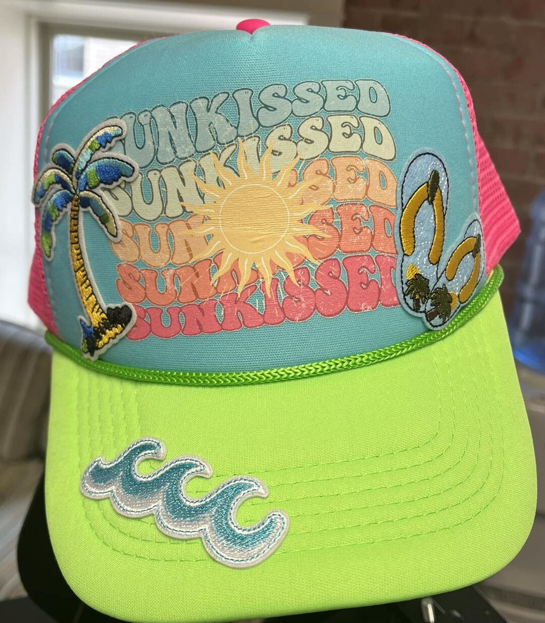The Sunkissed Trucker Hat With Tassel Chain