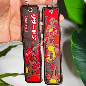 Llavero de anime bordado de doble cara: regalo para fans y coleccionistas de anime Poke 09
