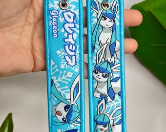 Portachiavi PokémonAnime Jet Tag • Ricamato su entrambi i lati • Design Glace 01