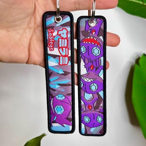 Chaveiro Pokémon Anime Jet Tag / Chaveiro Dupla Face – Design Sable 01