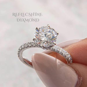 RARE D color VVS2 Clarity Round Cut 2.20 carat IGI Certified Lab Grown Diamond Hidden Halo Engagement Ring with Round Pavé Side Diamonds