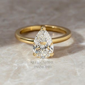 Pear Cut 2.05 Carat IGI Certified F Color VVS2 Clarity Lab Grown Hidden Halo Diamond Solitaire Engagement Ring, Side Round Diamonds 14k Gold