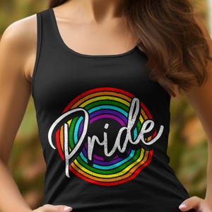 May include: Black tank top with a rainbow circle design and the word "Pride" in white script. The rainbow features the colors red, orange, yellow, green, blue, and purple. The tank top is sleeveless and has a scoop neck.