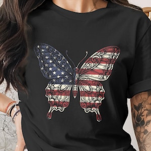Black t-shirt featuring a butterfly with U.S. flag wings.