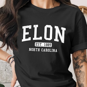 Black t-shirt with "ELON EST. 1889 NORTH CAROLINA" in white text.