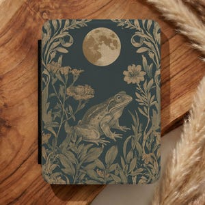 May include: A set of three ceramic mugs with a speckled, matte finish in cream, light grey, and dark grey. Each mug has a minimalist design, ideal for tea or coffee.