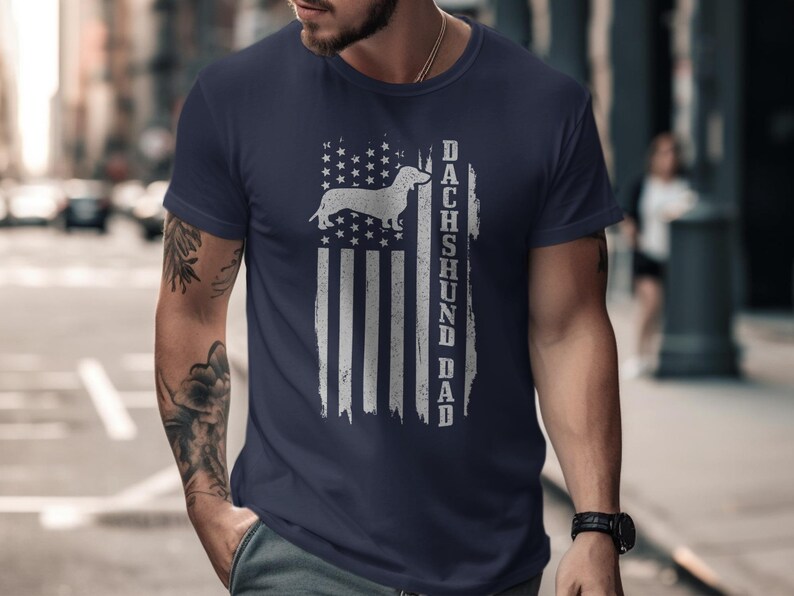 Navy t-shirt with distressed American flag and "DACHSHUND DAD" text.