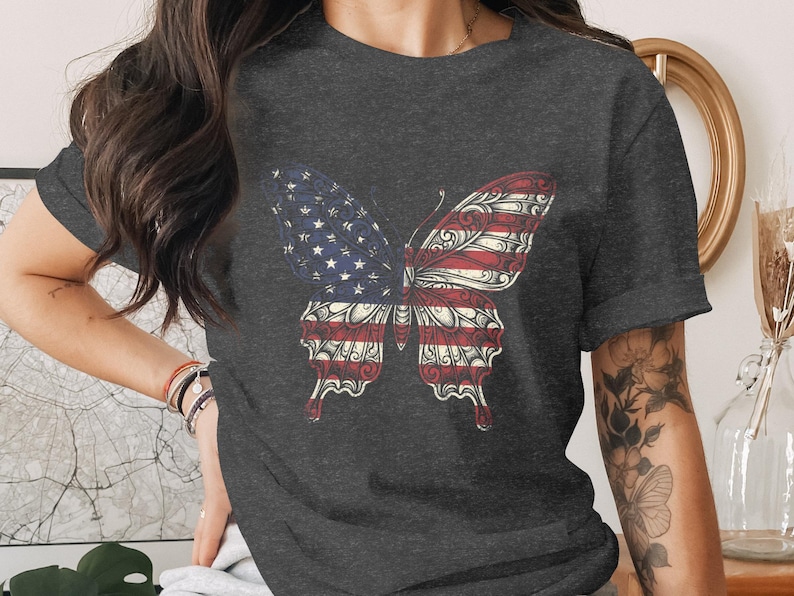 Dark gray t-shirt with an American flag butterfly graphic.