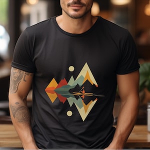 May include: A black t-shirt with a geometric design of mountains and a lake with a canoe in the middle. The design is in shades of orange, yellow, green, blue, and red.