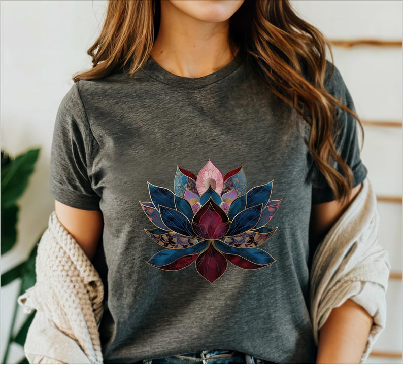 May include: A dark gray t-shirt with a colorful lotus flower design. The flower is made up of shades of blue, purple, pink, and gold.