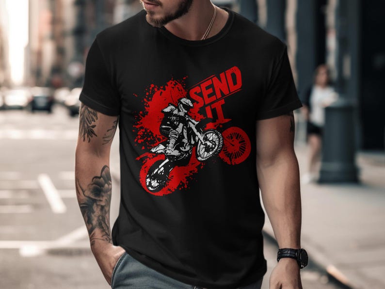 Black t-shirt with "SEND IT" text and a distressed graphic of a motocross rider.