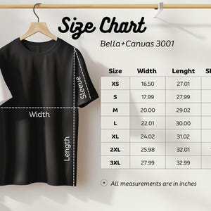 May include: A black t-shirt hanging on a wooden hanger, with a size chart to the right. The size chart shows measurements in inches for width, length, and sleeve length for sizes XS to 3XL. The text "Size Chart" is at the top.
