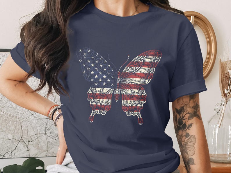 Navy t-shirt featuring a butterfly with American flag wings.