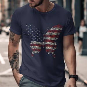 Man in navy t-shirt with American flag butterfly graphic.