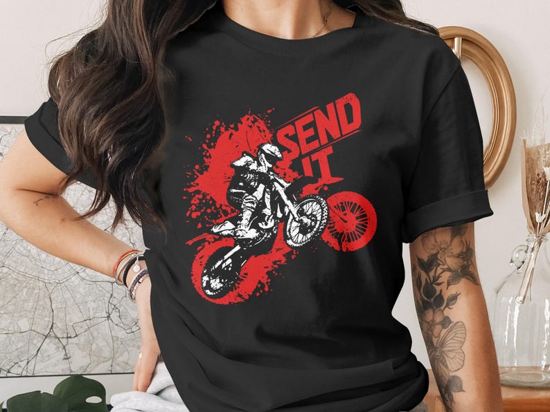 Black t-shirt with "SEND IT" and a motocross rider graphic.