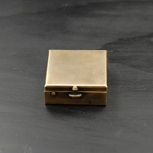 Simple 1.25" Square Brass Pill or Trinket Box You Can Customize with a Personalized Engraving -- Push Button Mechanism Opens Lid!