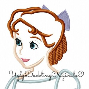May include: An embroidered design of a cartoon girl with brown hair, blue eyes, and a light blue dress. The girl is wearing a purple bow in her hair. The design is perfect for a child's clothing or a nursery.