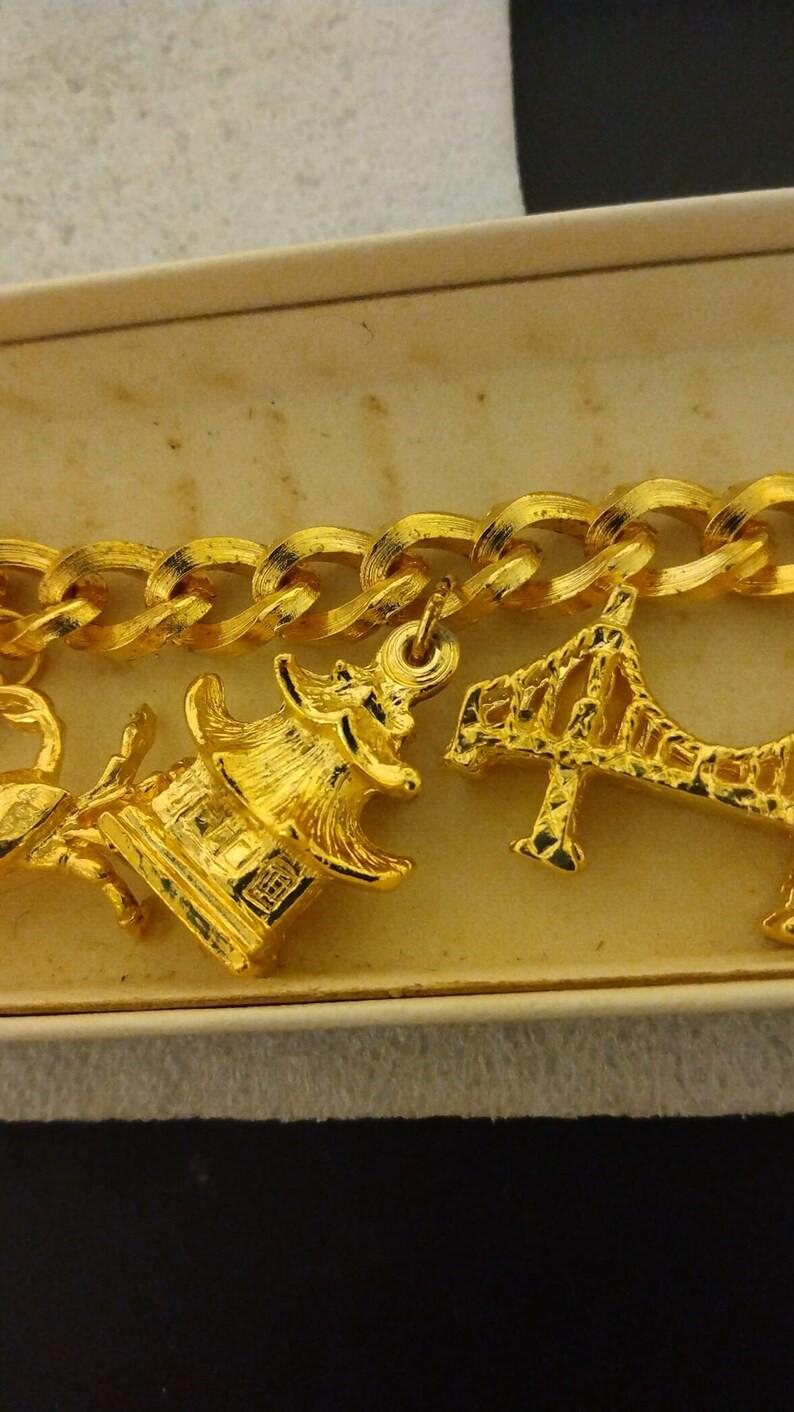 Urban Outfitters☆ ハート&コインチャーム・ブレスレット 1960s-era San Francisco Hi-lites Gold-tone Charm Bracelet
