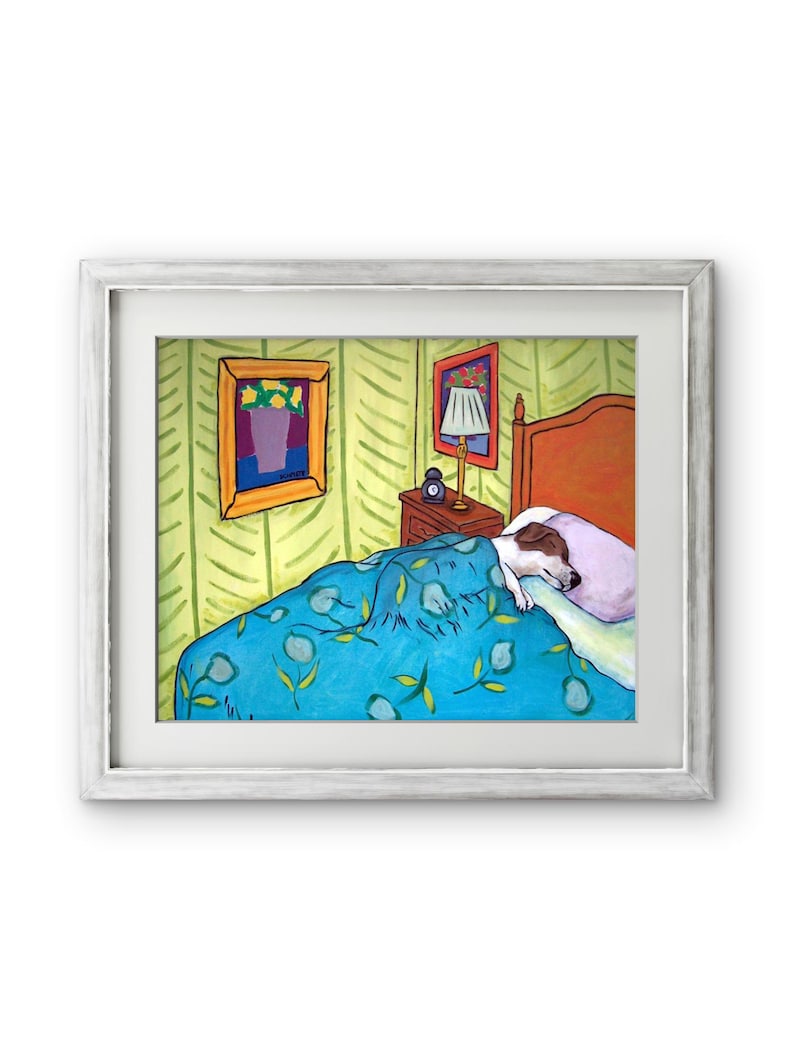 May include: A framed painting depicting a dog sleeping in a bed with a blue floral patterned blanket and a light purple pillow. The bedroom scene includes a wooden headboard, a nightstand with a lamp, and a framed floral artwork on the wall.
