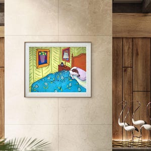 May include: A framed art print depicting a bedroom scene with a dog sleeping in a bed under a blue floral patterned blanket. The room features light green walls, a wooden headboard, a bedside table with a lamp, and two framed pictures on the wall.