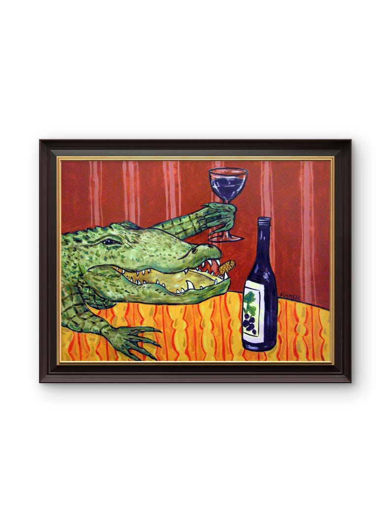 May include: A framed painting depicting a green alligator with an open mouth holding a wine glass in one claw. A blue wine bottle with a grape label sits on an orange patterned tablecloth against a red striped background in this artwork.