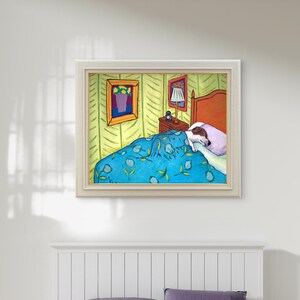 May include: A framed painting depicting a dog sleeping in a bed with a blue patterned quilt and a light purple pillow. The bedroom scene includes a wooden headboard, a nightstand with a lamp, and two framed pictures on the light green walls.