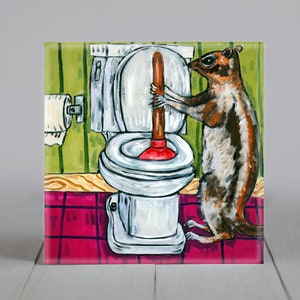 May include: A cartoon illustration of a chipmunk using a plunger to unclog a toilet. The chipmunk is brown and white with a black stripe down its back. The toilet is white with a red plunger. The background is green and pink.