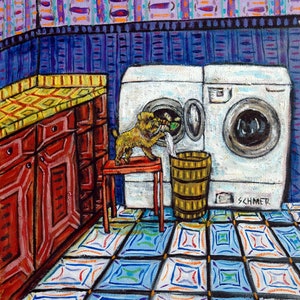 May include: A whimsical painting of a laundry room scene. A small, yellow dog stands on a red stool, reaching into a washing machine. The room features red cabinets, patterned tile flooring, and a blue and purple wall design.