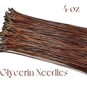 May include: A bundle of brown glycerin needles, with the text "4 oz" and "Glycerin Needles" in a serif font. The needles are a rich brown color and appear to be dried. The background is white.