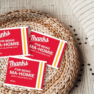 May include: Three red and white Valentine's Day cards with the text "Thanks for being Ma-Home Happy Valentine's Day" and a yellow stripe on the side.
