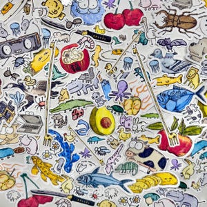 May include: A selection of colourful stickers with diverse illustrations. The stickers depict animals, food, and objects such as a laptop, radio, and a Japanese Daruma doll. The stickers are in various shapes and sizes.